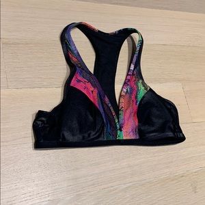 Koral faux snakeskin shiny black sports bra